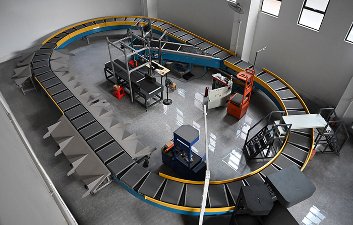 環(huán)型交叉帶分揀機(jī)的工作原理、特點(diǎn)及應(yīng)用